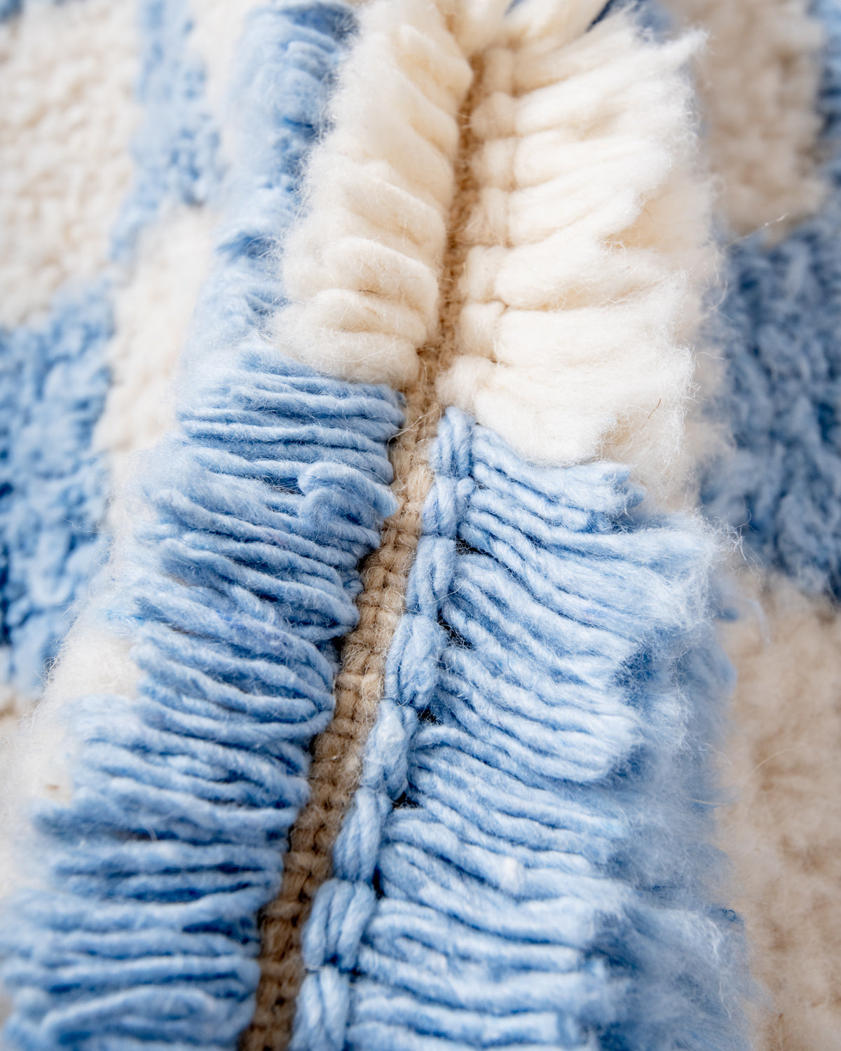 Modern, designer, handcrafted Berber rug from Morocco. Beniourain carpet with beautiful colours and patterns and fluffy wool texture.